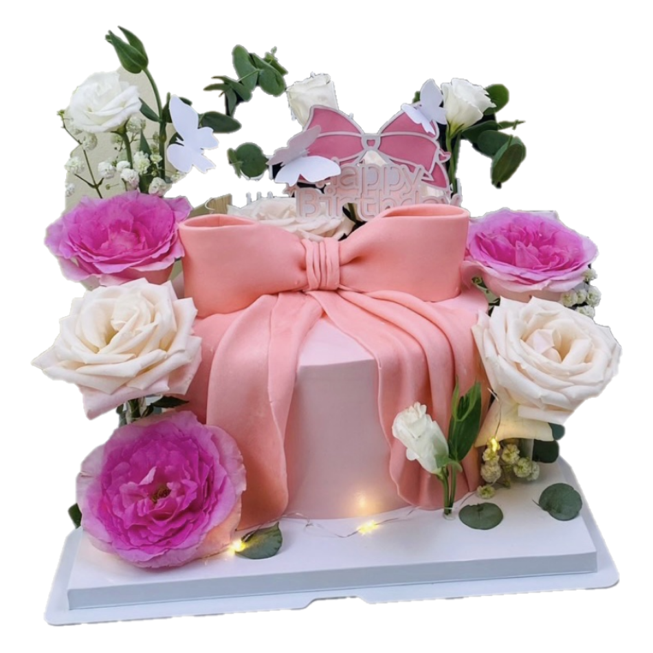 Bánh kem tươi nơ fondant và hoa tươi